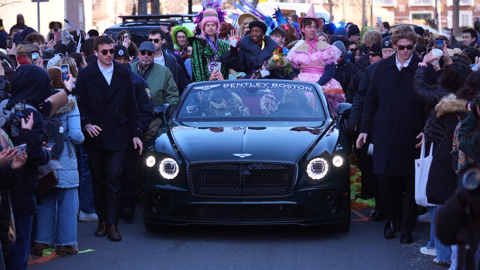 Harvard University's Hasty Pudding Theatricals Woman of the Year Cynthia Erivo rides with two character actors during a parade in her honor, Wednesday, Feb. 5, 2025, in Cambridge, Mass. (AP Photo/Charles Krupa)