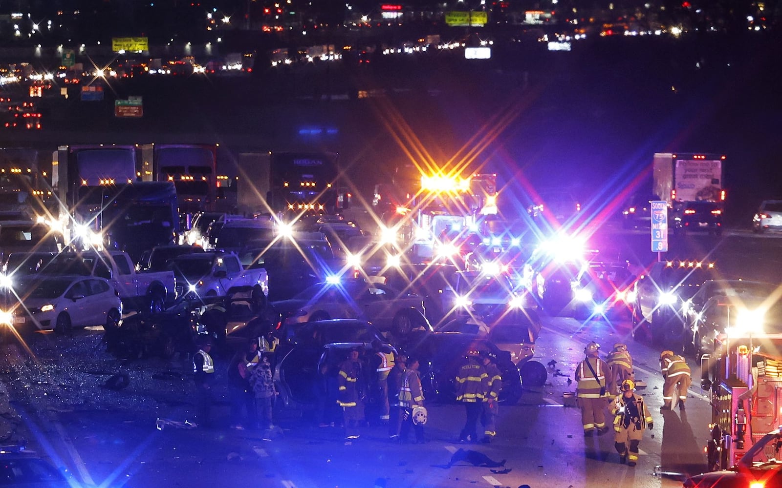 Both sides of Interstate 75 were closed Tuesday afternoon in Warren County after a crash near state Route 122. NICK GRAHAM/STAFF