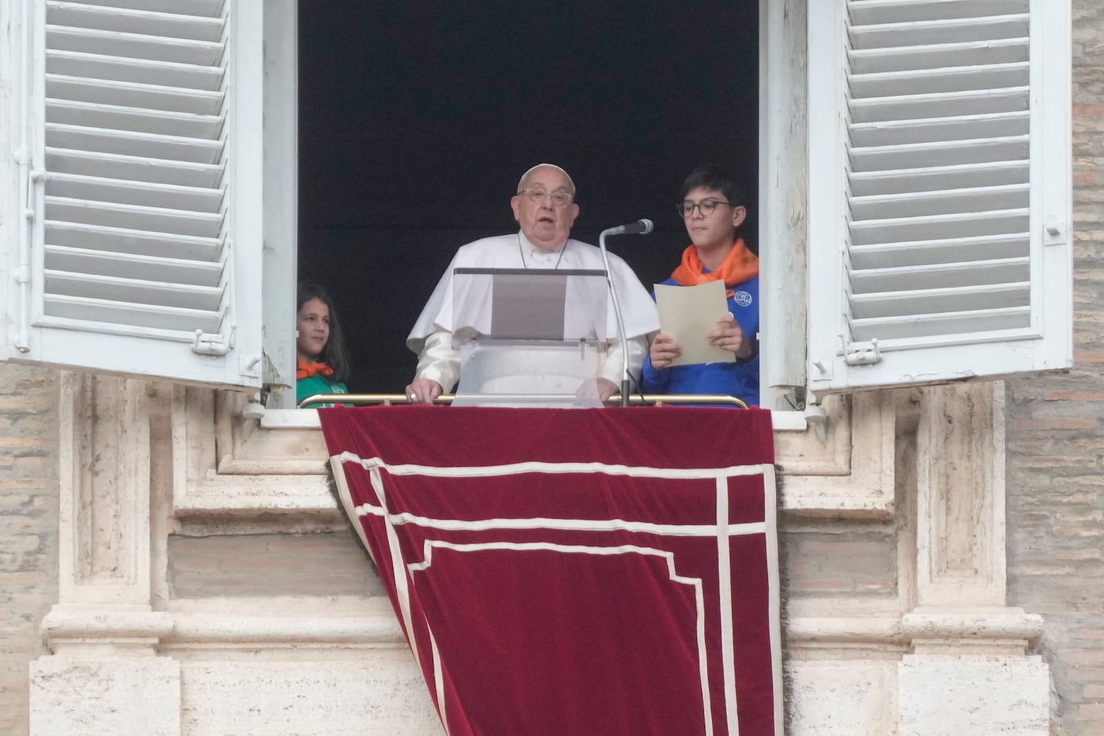 Pope Francis delivers the Angelus noon prayer in st. Peter's Square at the Vatican, Sunday, Jan. 26, 2025. (AP Photo/Gregorio Borgia)