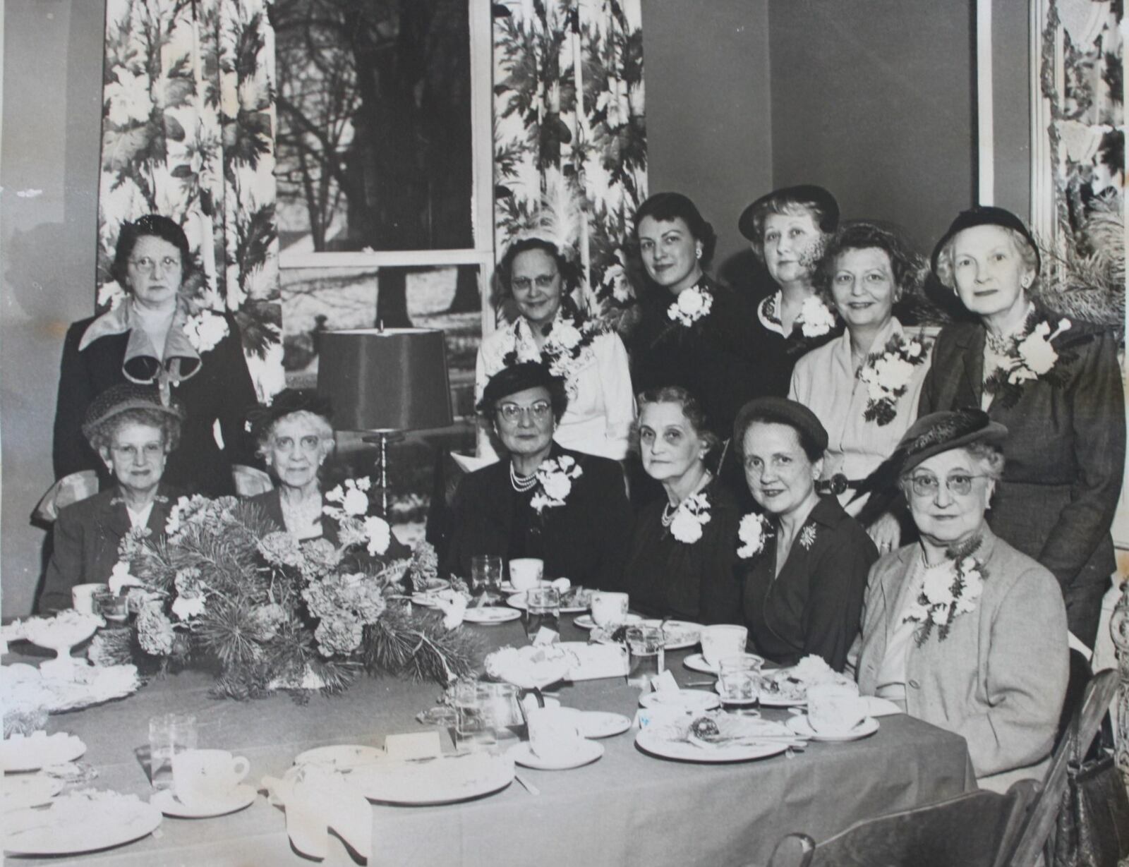 Writing on the back of this photo of the December 1952 gathering of past presidents of the Woman's Town Club fails to identify any of them by their first names, a standard practice of early club records that makes it difficult for current members to find out more about the women. Seated, from left, are Mrs. Holmes Collins, Mrs. George Dial, Mrs. Karl Schreiber, Mrs. Dan Shouvlin, Mrs. John Harner and Mrs. Jack Kirchwerm. Standing, from left, are Mrs. C.L. Nisley, Mrs. E. Marion Frock, Mrs. Adrian Lebold, Mrs. Carl Berg, Mrs. Chrales Bray and Mrs. William McDonald.