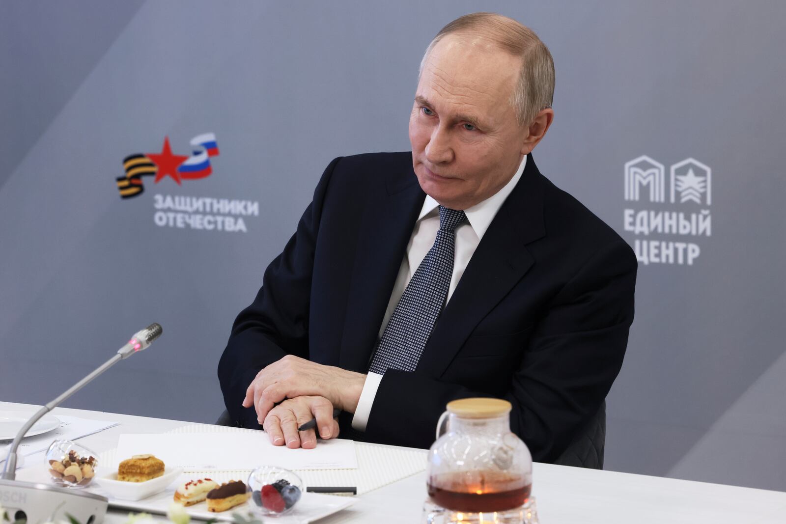 Russian President Vladimir Putin attends a meeting with workers and wards of The Defenders of the Fatherland Foundation in Moscow, Russia, Thursday, March 6, 2025. (Mikhail Metzel, Sputnik, Kremlin Pool Photo via AP)