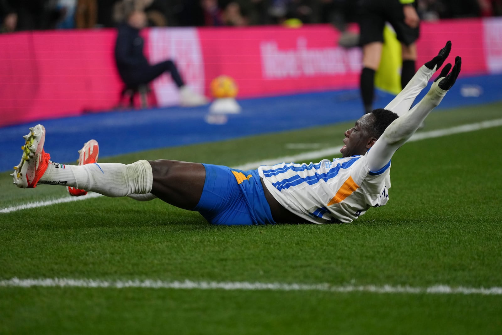 Brighton's Yankuba Minteh celebrates after he scored during the English Premier League soccer match between Brighton and Chelsea in Brighton, England, Friday, Feb. 14, 2025. (AP Photo/Dave Shopland)