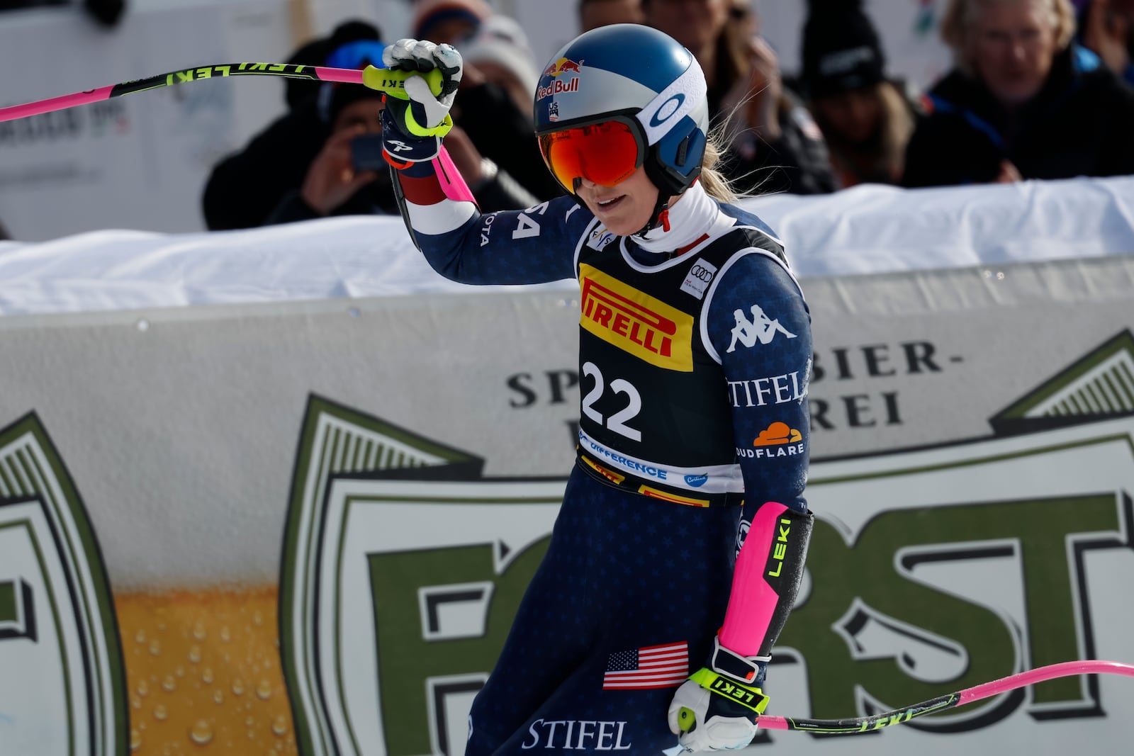 United States' Lindsey Vonn acknowledges the crowd as she arrives at the finish area after crashing during an alpine ski, women's World Cup Super-G, in Cortina d'Ampezzo, Italy, Sunday, Jan. 19, 2025 (AP Photo/Alessandro Trovati)