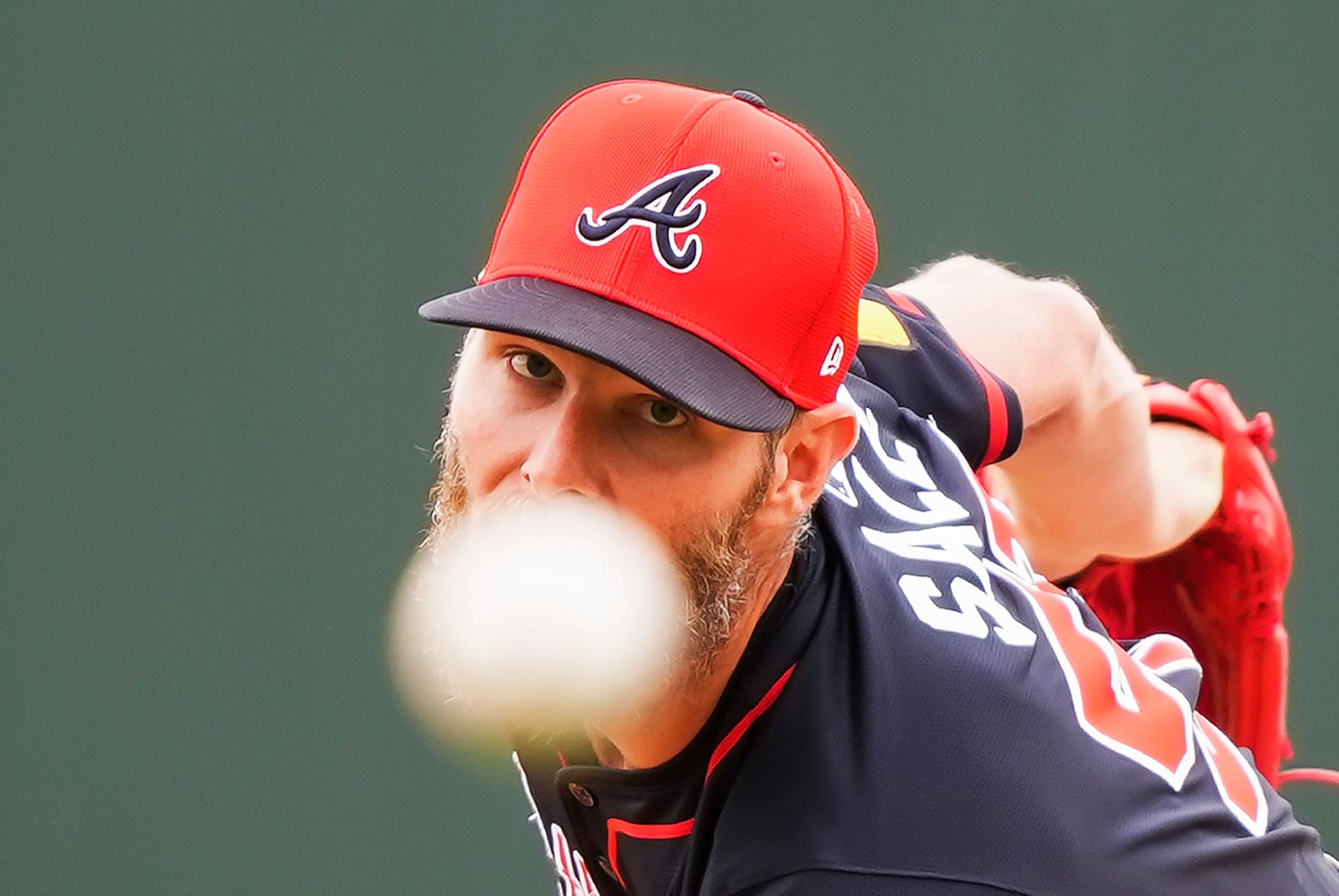 Atlanta Braves pitcher Chris Sale throws in the first inning of a spring training baseball game against the Minnesota Twins in Fort Myers, Fla., Saturday, Feb. 22, 2025. (AP Photo/Gerald Herbert)