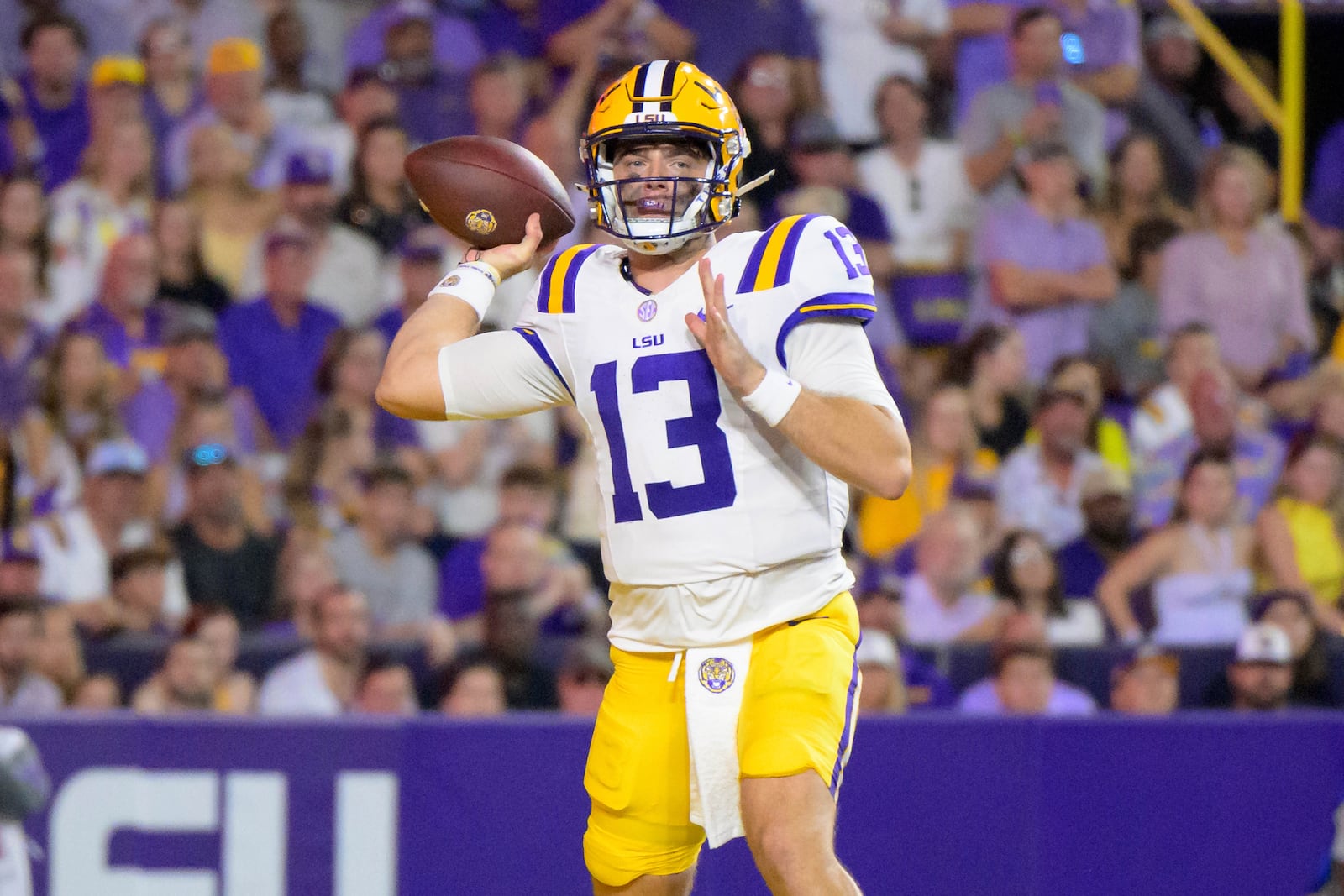 LSU quarterback Garrett Nussmeier (13) throws during the first half of an NCAA college football game against Mississippi in Baton Rouge, La., Saturday, Oct. 12, 2024. (AP Photo/Matthew Hinton)