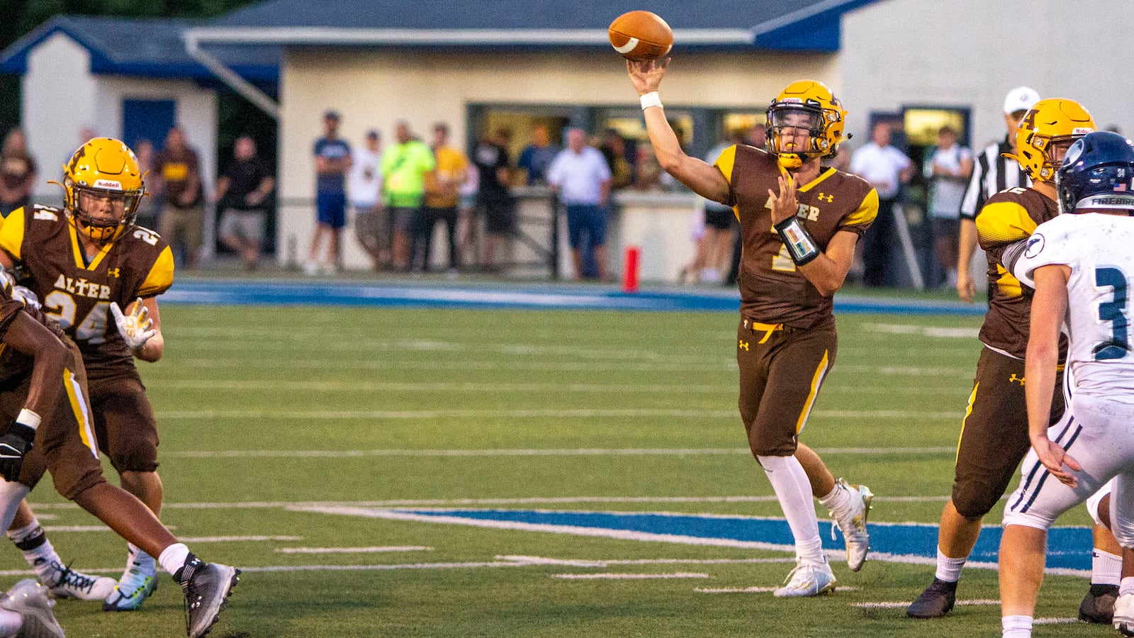 Alter's Gavin Connor throws a pass during Fairmont's 31-7 victory over Alter last year at Roush Stadium.