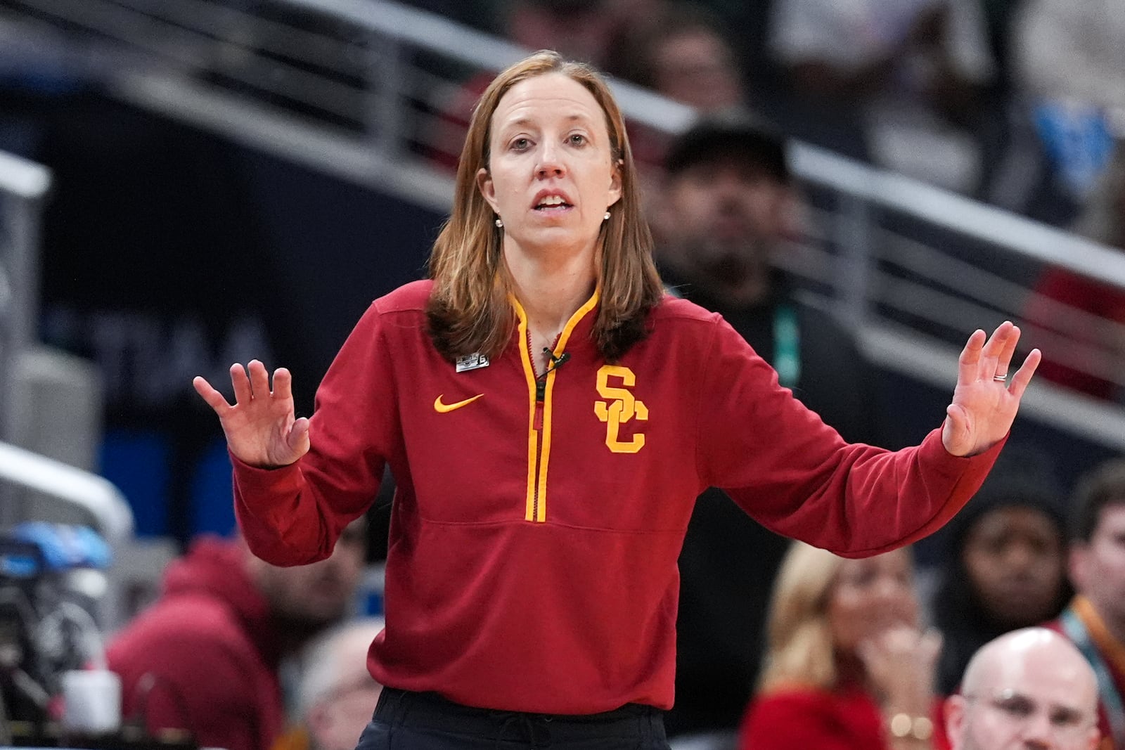 Southern California head coach Lindsay Gottlieb watches against Michigan during the second half of an NCAA college basketball game in the semifinals of the Big Ten Conference tournament in Indianapolis, Saturday, March 8, 2025. (AP Photo/Michael Conroy)