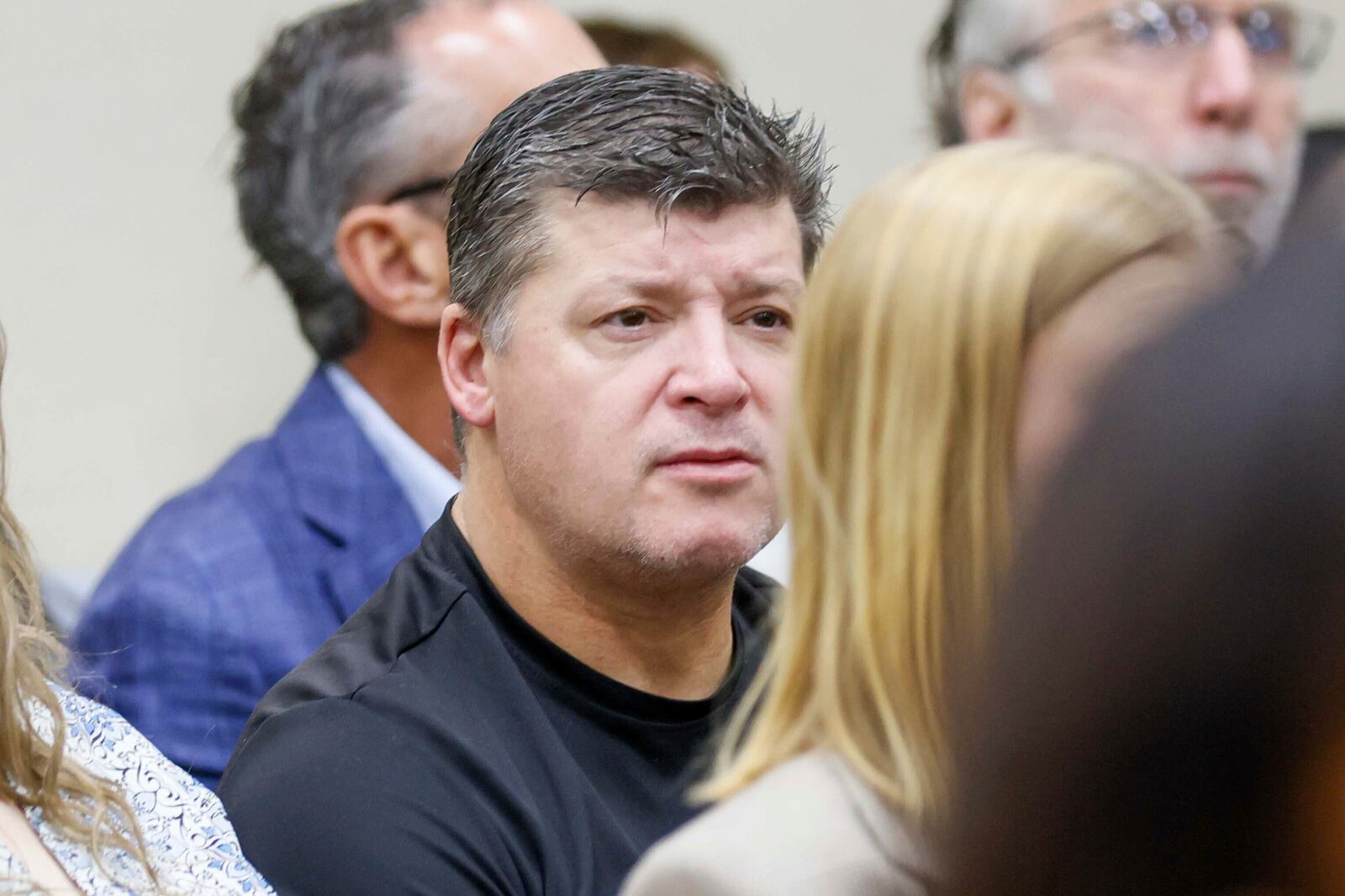 Jason Riley, center, Laken Riley's father, listens during the Jose Ibarra trial at Athens-Clarke County Superior Court on Monday, Nov. 18, 2024, in Athens, Ga. (Miguel Martinez/Atlanta Journal-Constitution via AP)