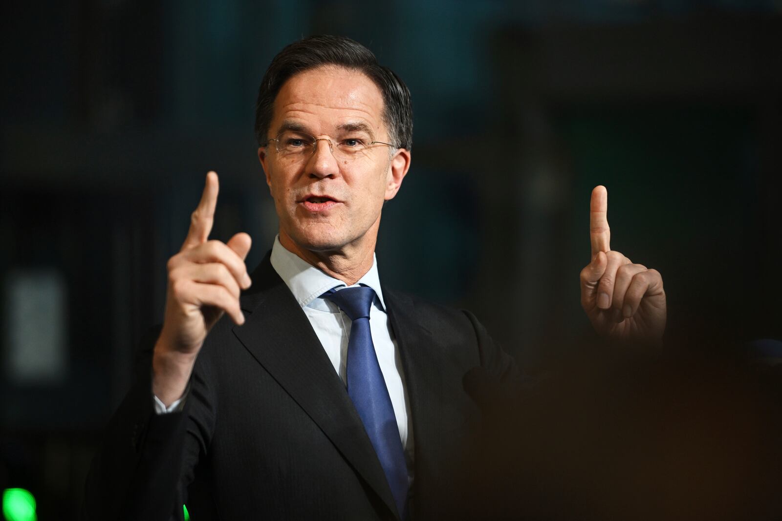 NATO Secretary General Mark Rutte speaks with the media as he arrives for a meeting of NATO defense ministers at NATO headquarters in Brussels, Thursday, Feb. 13, 2025. (AP Photo/Harry Nakos)