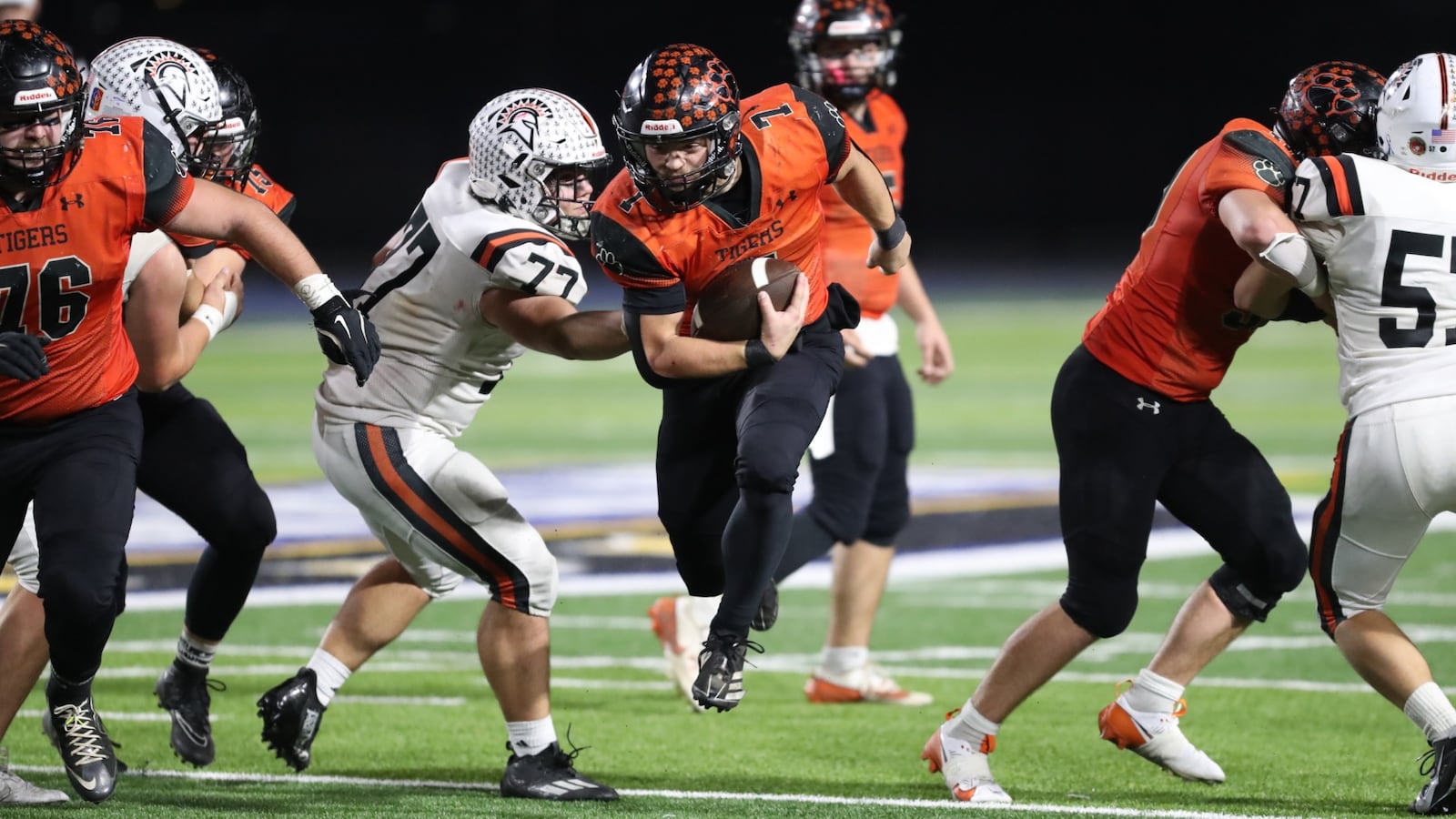 West Liberty-Salem senior Josh Wilcoxon runs the ball during their game against Waynesville on Friday night at Dayton Welcome Stadium. The Tigers won 45-42. Michael Cooper/CONTRIBUTED