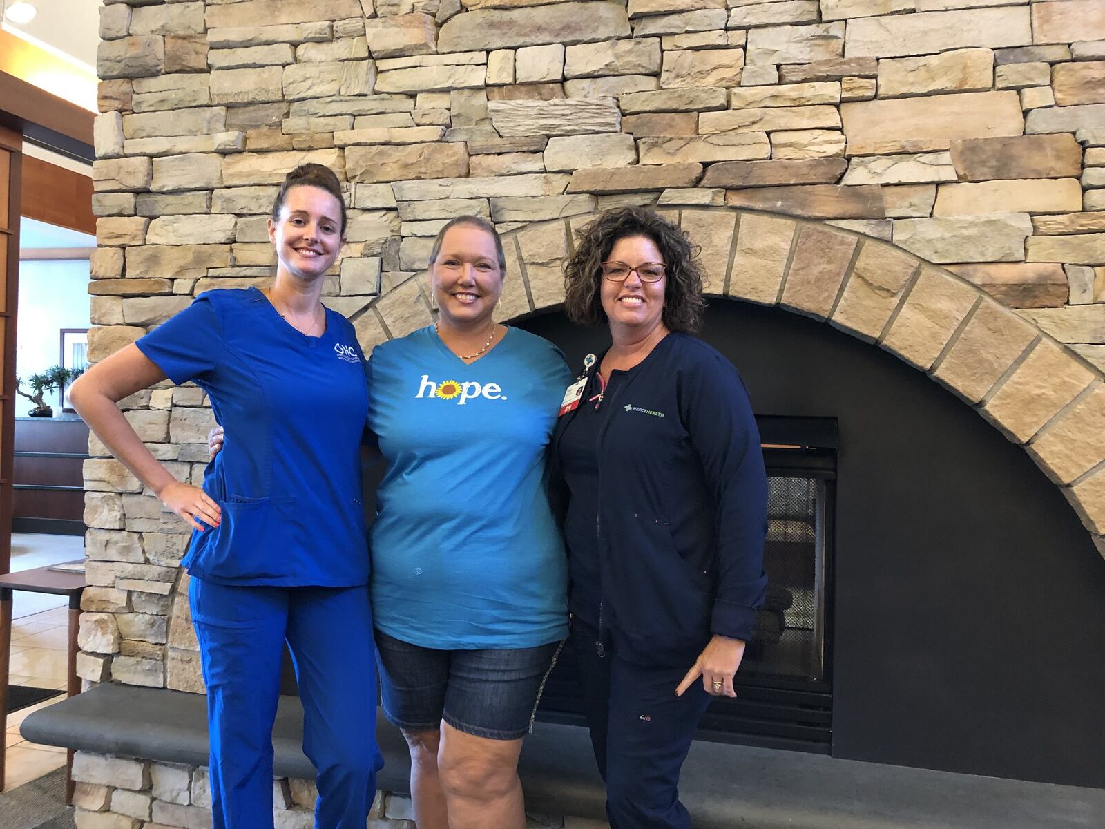 Christine Swinford, center, recently became a breast cancer survivor with help from Mercy Health Springfield Regional Cancer Center and infusion nurse Stephanie Bonomo, left, and breast health navigator Tracy Adrian. BRETT TURNER/CONTRIBUTED