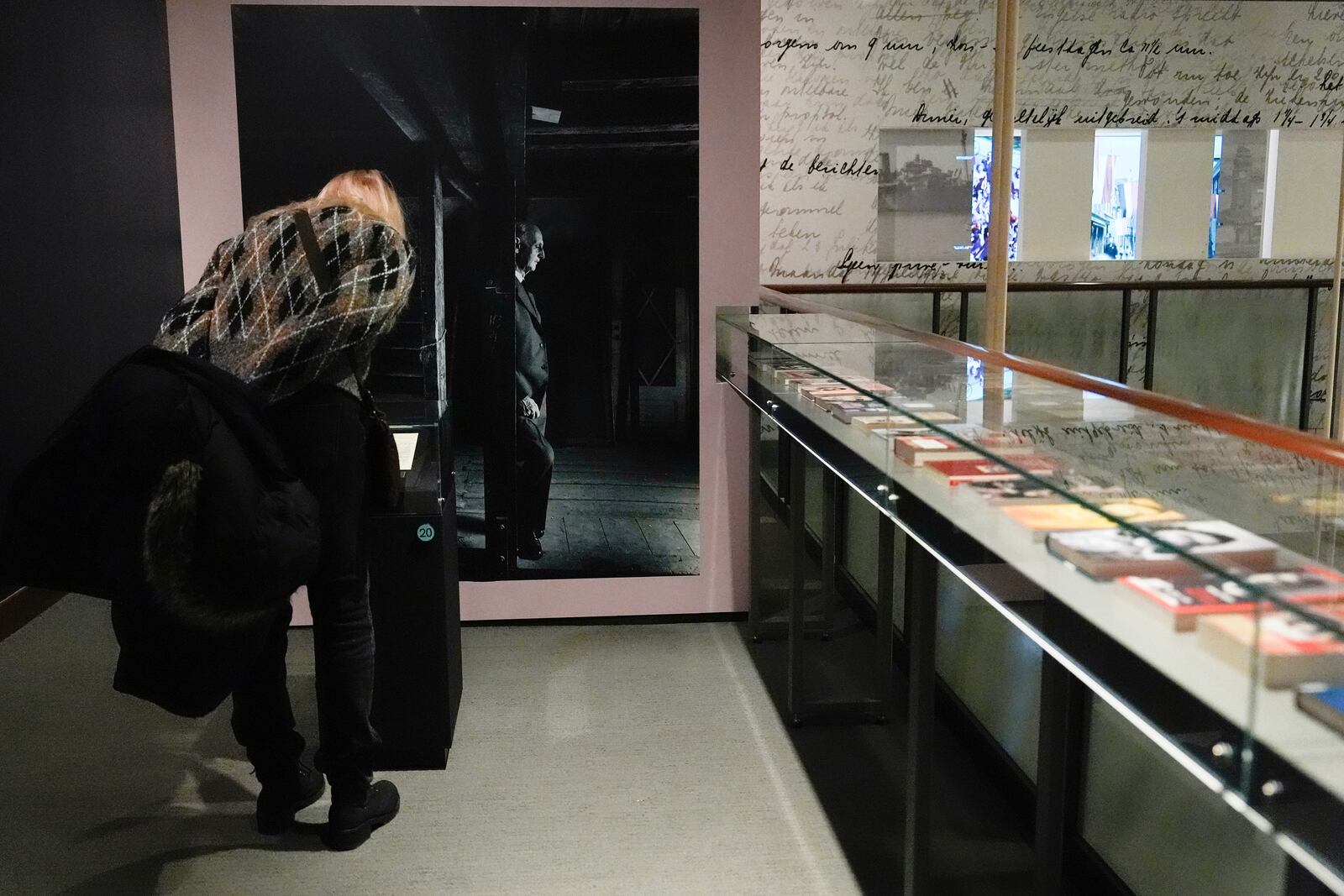 A person looks at the "Anne Frank the Exhibition" during its opening on International Holocaust Remembrance Day at the Center for Jewish History, Monday, Jan. 27, 2025, in New York. (AP Photo/Julia Demaree Nikhinson)