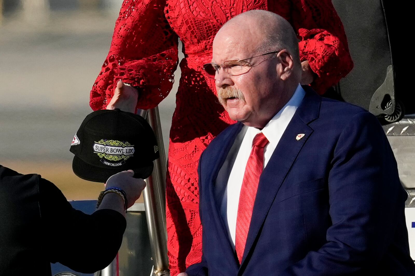 Kansas City Chiefs head coach Andy Reid arrives at New Orleans international airport, Sunday, Feb. 2, 2025, in Kenner, La. ahead of the NFL Super Bowl 59 football game between the Philadelphia Eagles and the Kansas City Chiefs. (AP Photo/David J. Phillip)