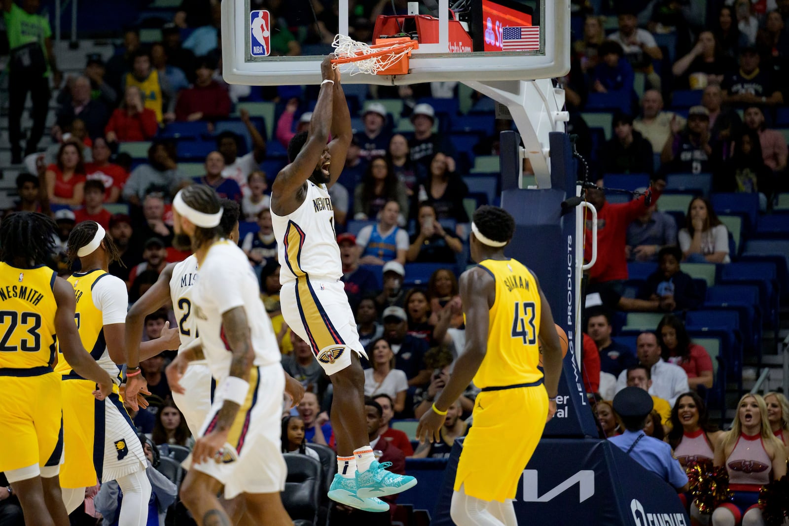 New Orleans Pelicans forward Zion Williamson dunks against Indiana Pacers forward Pascal Siakam (43) during the first half of an NBA basketball game in New Orleans, Friday, Nov. 1, 2024. (AP Photo/Matthew Hinton)