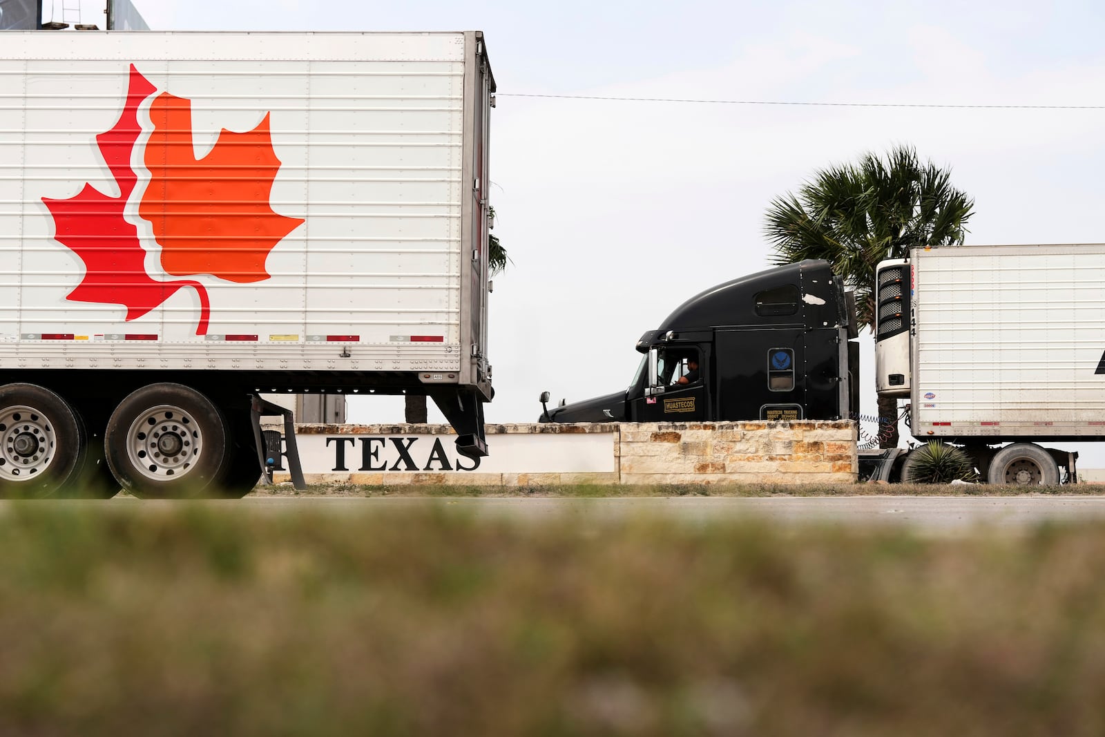 Truck drivers wait to enter Mexico from the U.S. at the Pharr International Bridge, Tuesday, March 4, 2025, in Pharr, Texas. (AP Photo/Eric Gay)