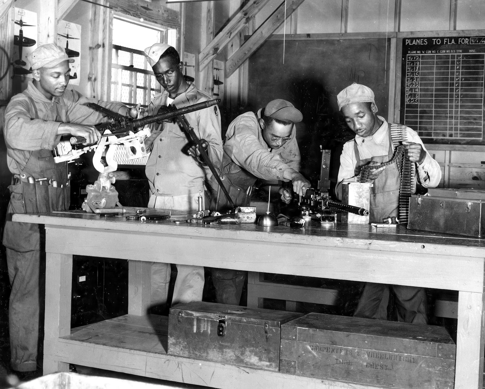 In this image provided by the U.S. Air Force, armorers and other ground personnel undergo training at Chanute Field, Ill., during World War II (U.S. Air Force via AP)