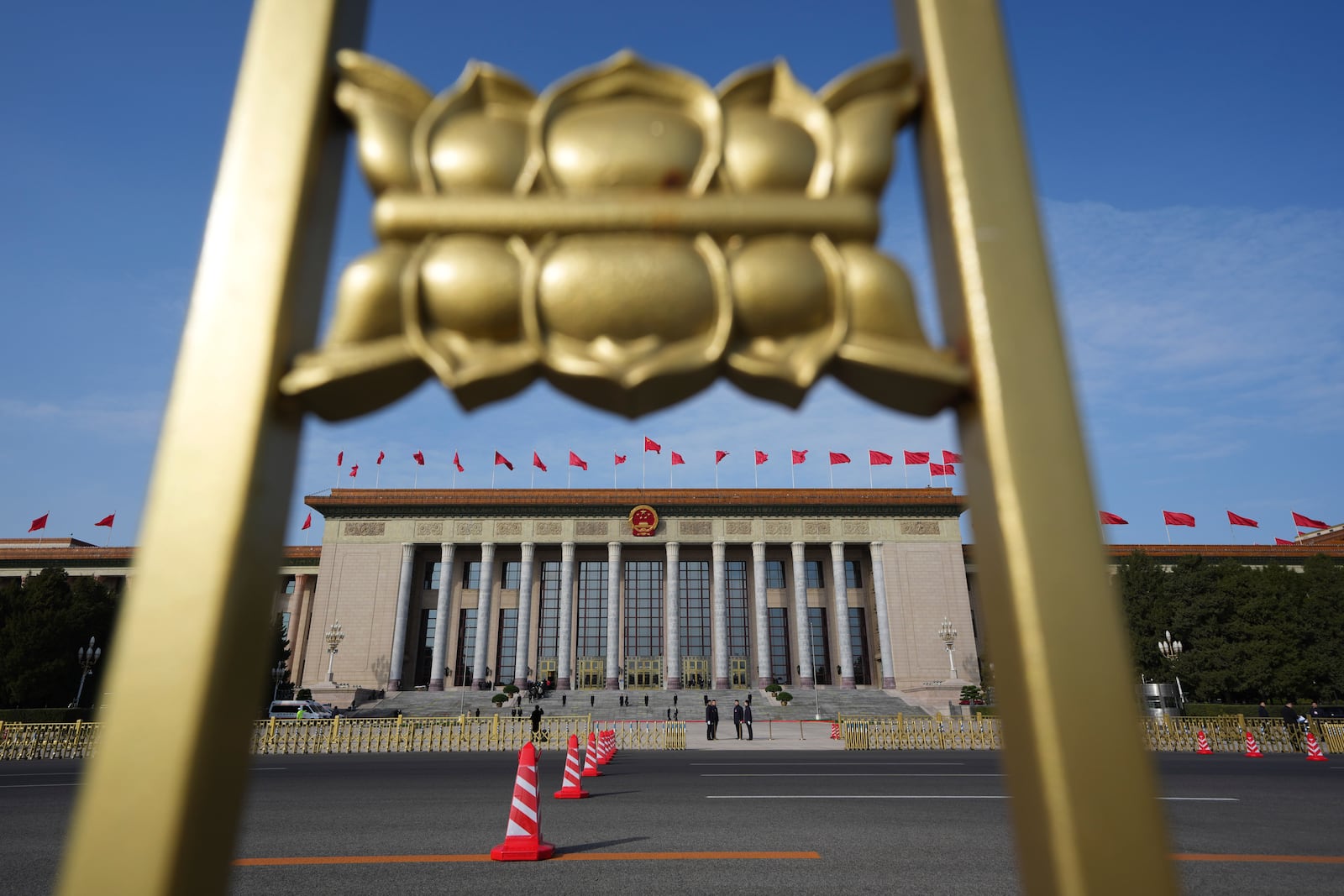 The Great Hall of the People is seen on the eve of the National People's Congress in Beijing, Tuesday, March 4, 2025. (AP Photo/Ng Han Guan)