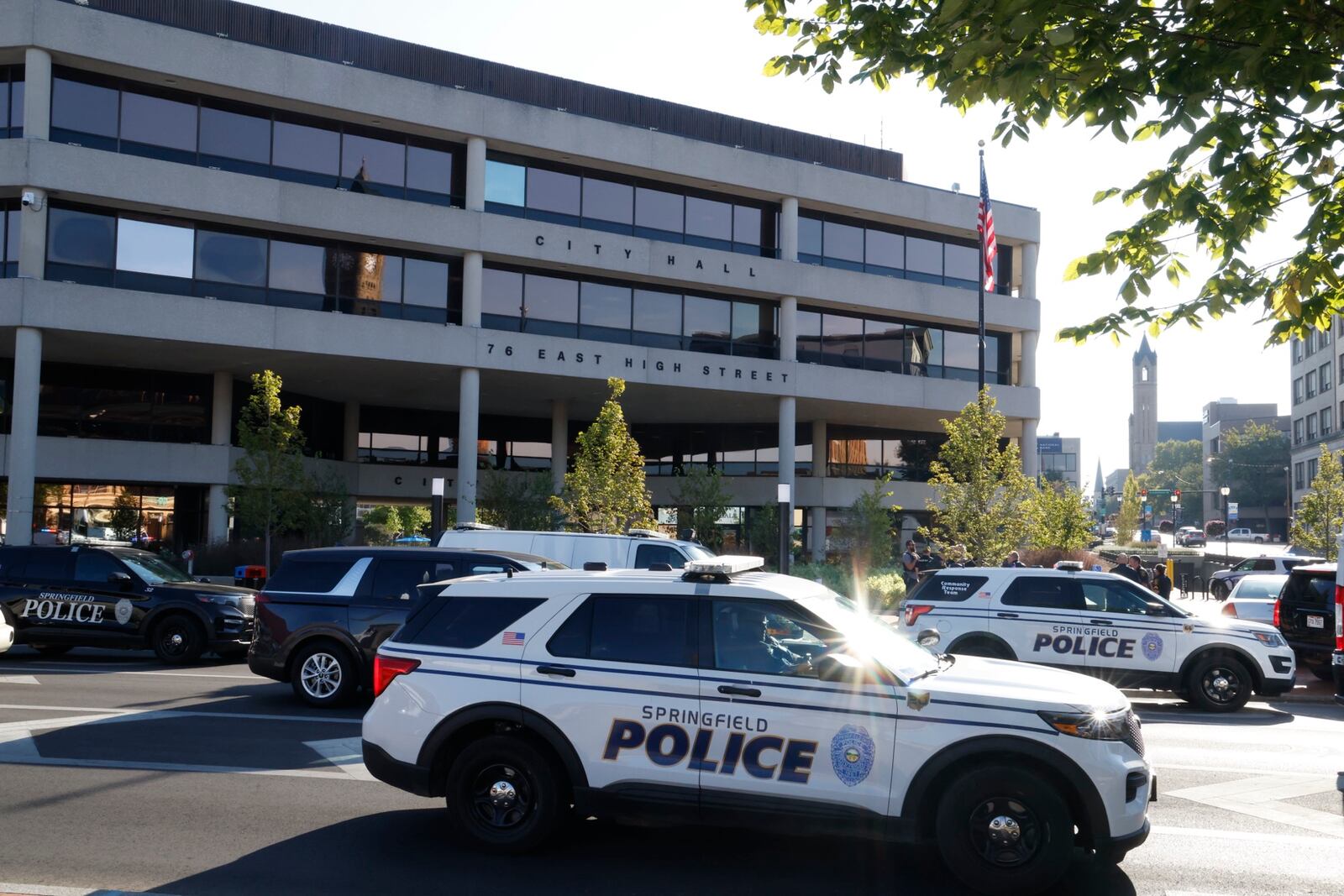 Springfield, Dayton police, along with the State Highway Patrol search the Springfield City Hall after it was evacuated due to a threat Sept. 12, 2024. BILL LACKEY/STAFF