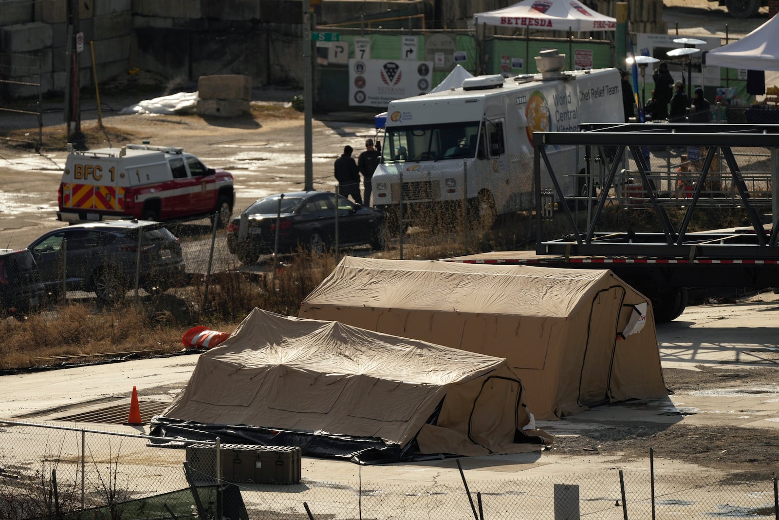 Emergency vehicles and recovery operations are seen near the mouth of the Anacostia River at the Potomac River near Ronald Reagan Washington National Airport, Saturday, Feb. 1, 2025, in Washington. (AP Photo/Carolyn Kaster)