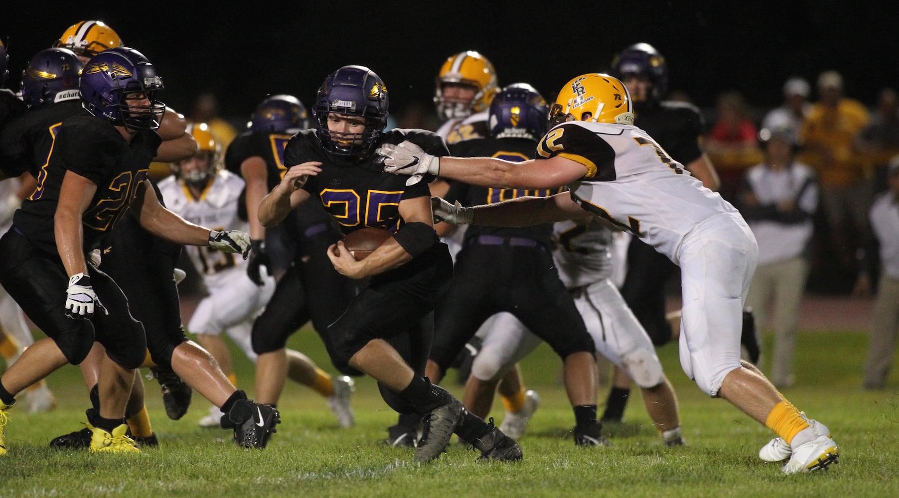 Photos: Mechanicsburg beats Kenton Ridge 27-3 in Week 1