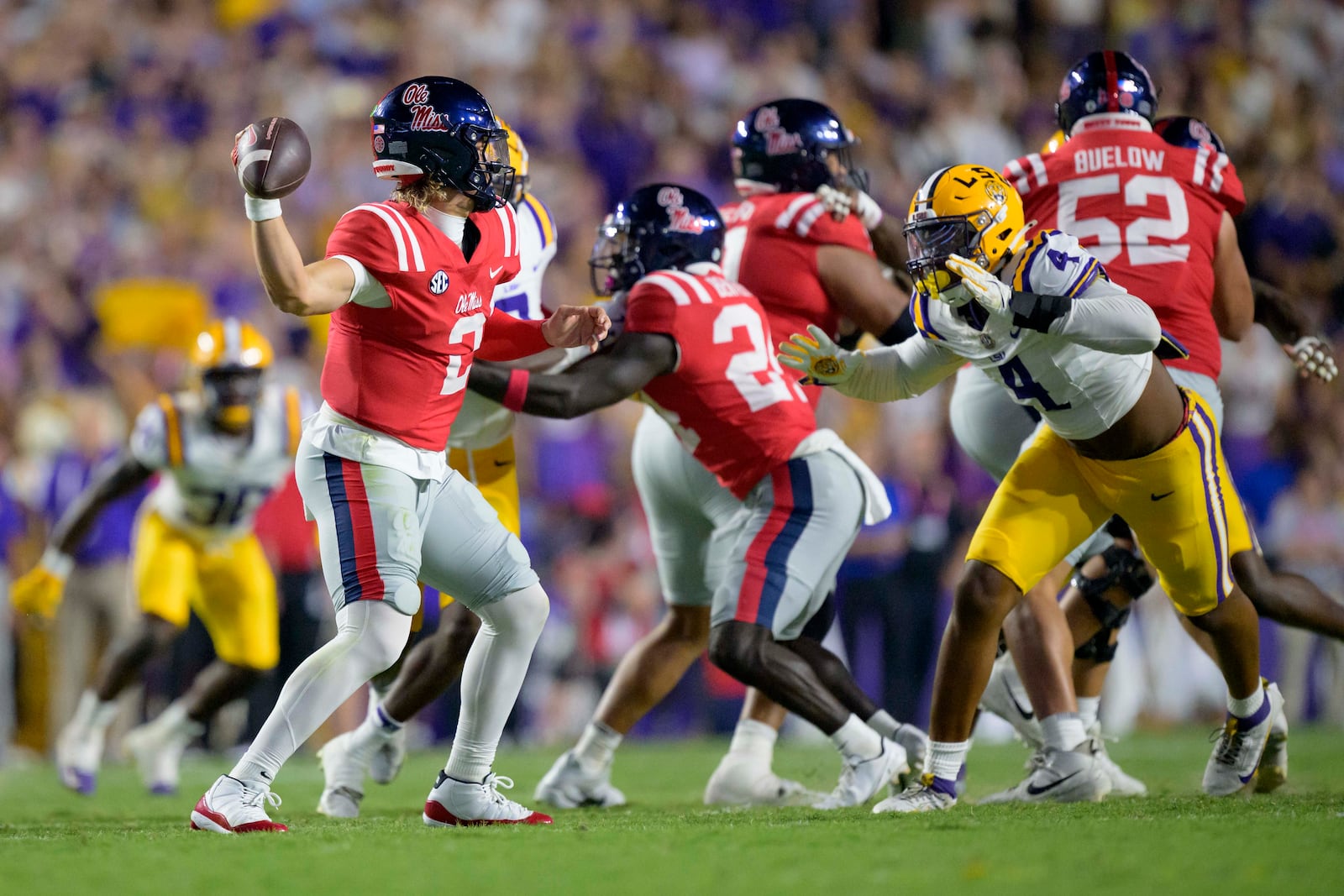 Mississippi quarterback Jaxson Dart (2) throws against LSU during the first half of an NCAA college football game in Baton Rouge, La., Saturday, Oct. 12, 2024. (AP Photo/Matthew Hinton)