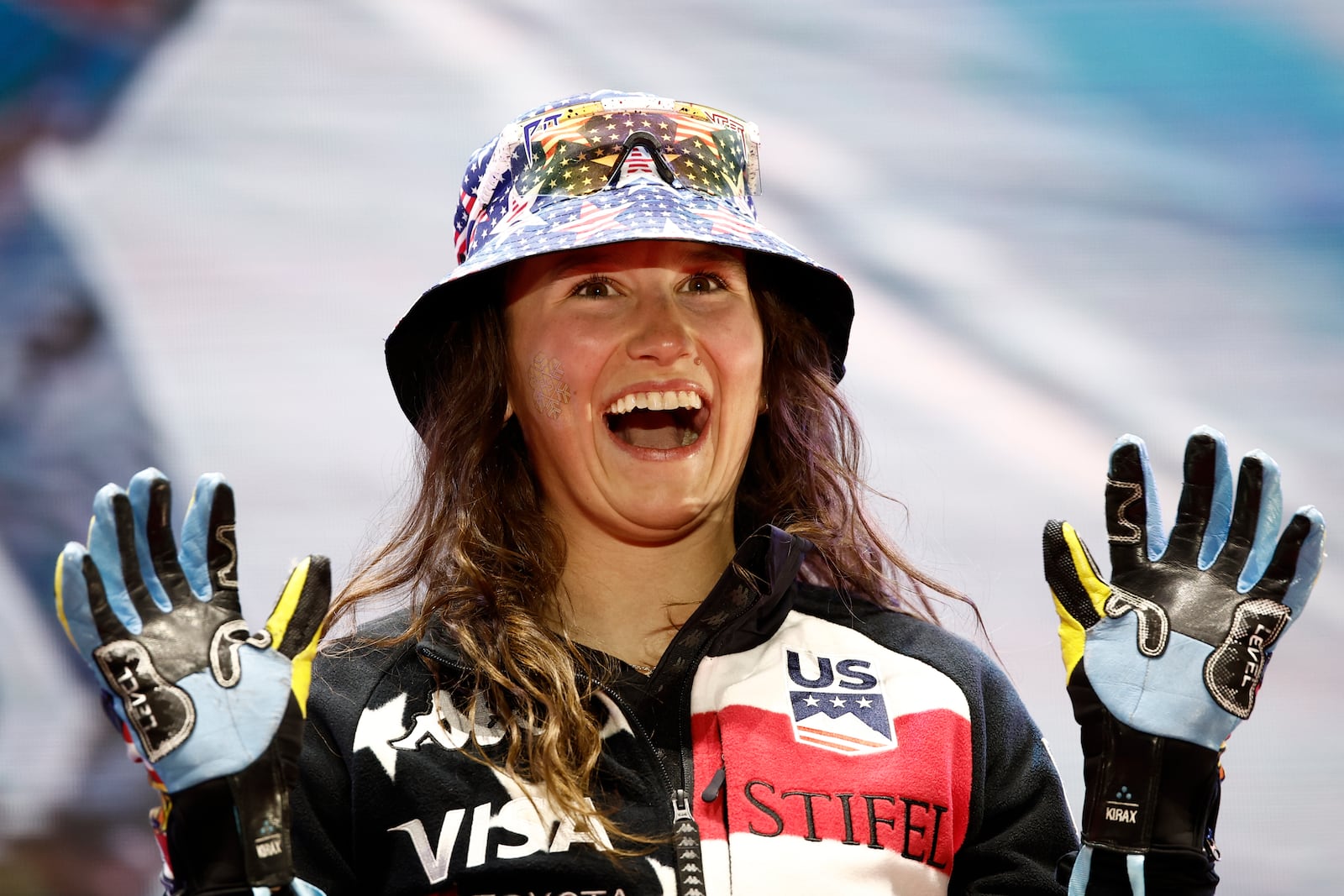 United States' Lauren Macuga celebrates moments before being given a bronze medal for a women's Super-G, at the Alpine Ski World Championships, in Saalbach-Hinterglemm, Austria, Thursday, Feb. 6, 2025. (AP Photo/Gabriele Facciotti)