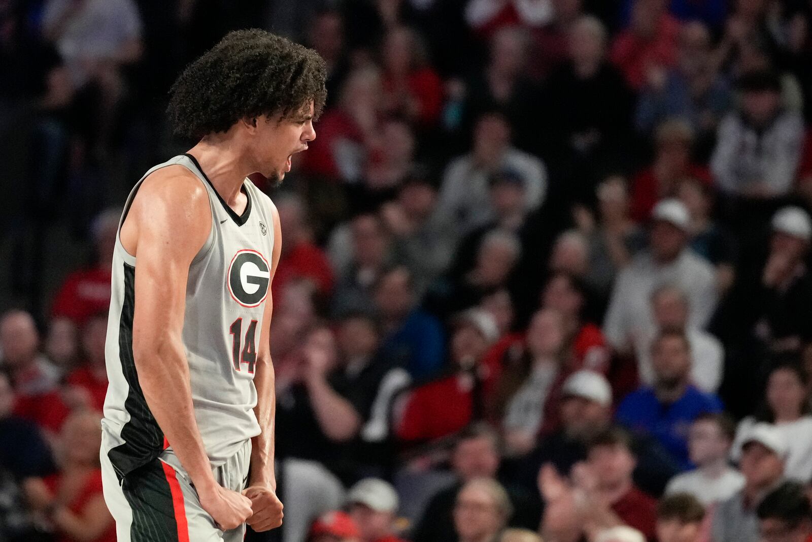 Georgia forward Asa Newell (14) reacts after a foul during an NCAA college basketball game against Florida, Tuesday, Feb. 25, 2025, in Athens, Ga. (AP Photo/Brynn Anderson)