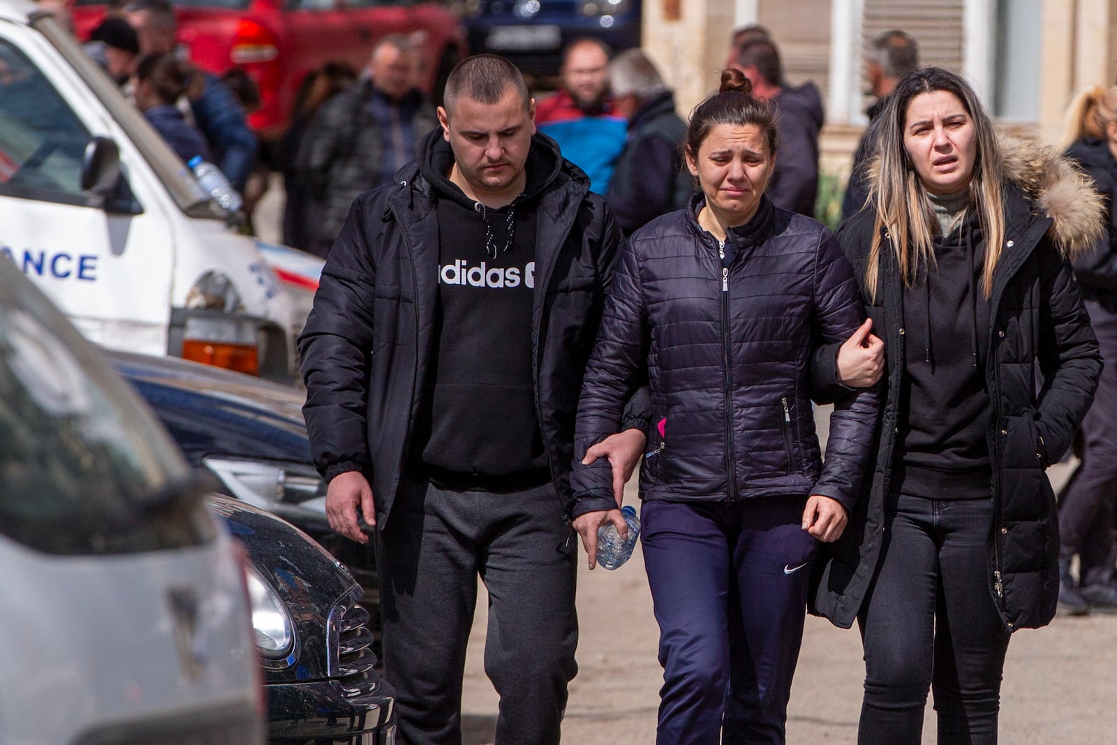 Relatives of victims leave a hospital in the town of Kocani, North Macedonia, Monday, March 17, 2025, following a massive fire in the nightclub early Sunday. (AP Photo/Visar Kryeziu)