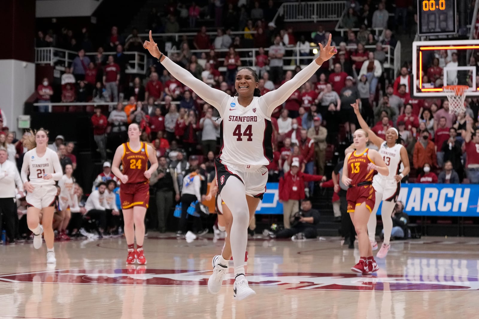 FILE - Then-Stanford forward Kiki Iriafen celebrates during a second-round college basketball game in the women's NCAA Tournament against Iowa State in Stanford, Calif., Sunday, March 24, 2024. (AP Photo/Jeff Chiu, File)