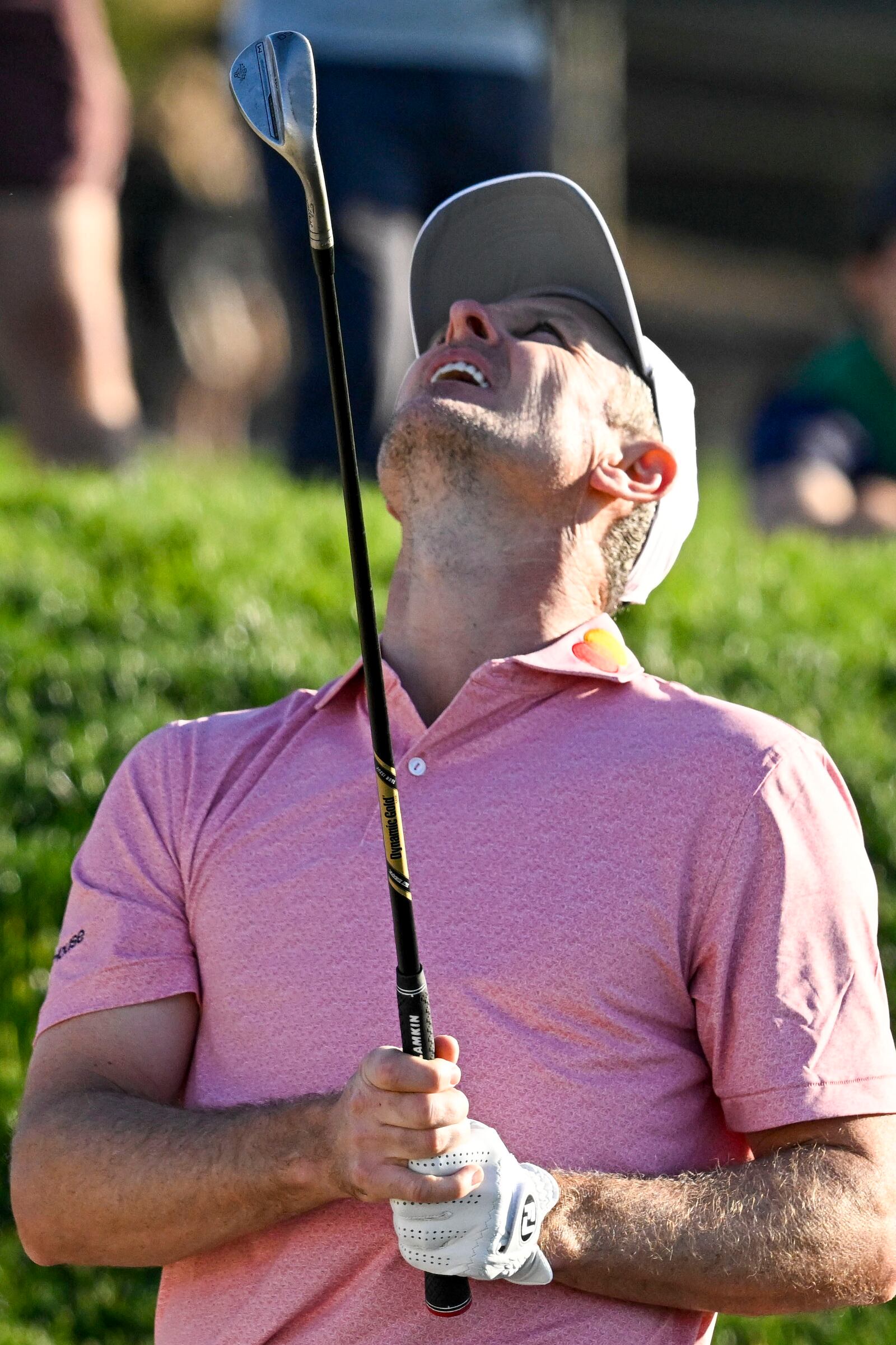 Maverick McNealy reacts after missing a bunker on the 13th hole of the South Course at Torrey Pines during the second round of the Farmers Insurance Open golf tournament Thursday, Jan. 23, 2025, in San Diego. (AP Photo/Denis Poroy)