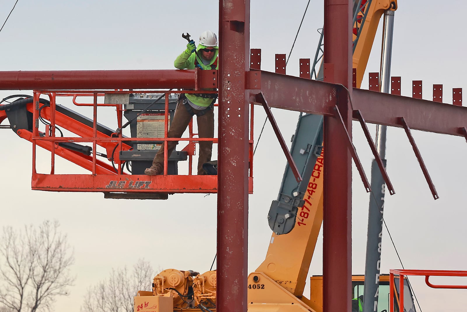 Construction crews work on the new National Advanced Air Mobility Center of Excellence Wednesday, Jan. 11, 2023 at the Springfield-Beckley Municipal Airport. BILL LACKEY/STAFF