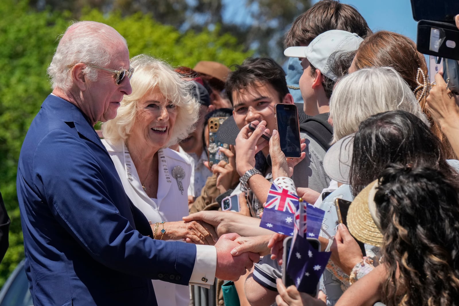 Britain's King Charles III, and Queen Camilla greets by public at the Australian War Memorial in Canberra, Monday, Oct. 21, 2024. (AP Photo/Mark Baker, Pool)