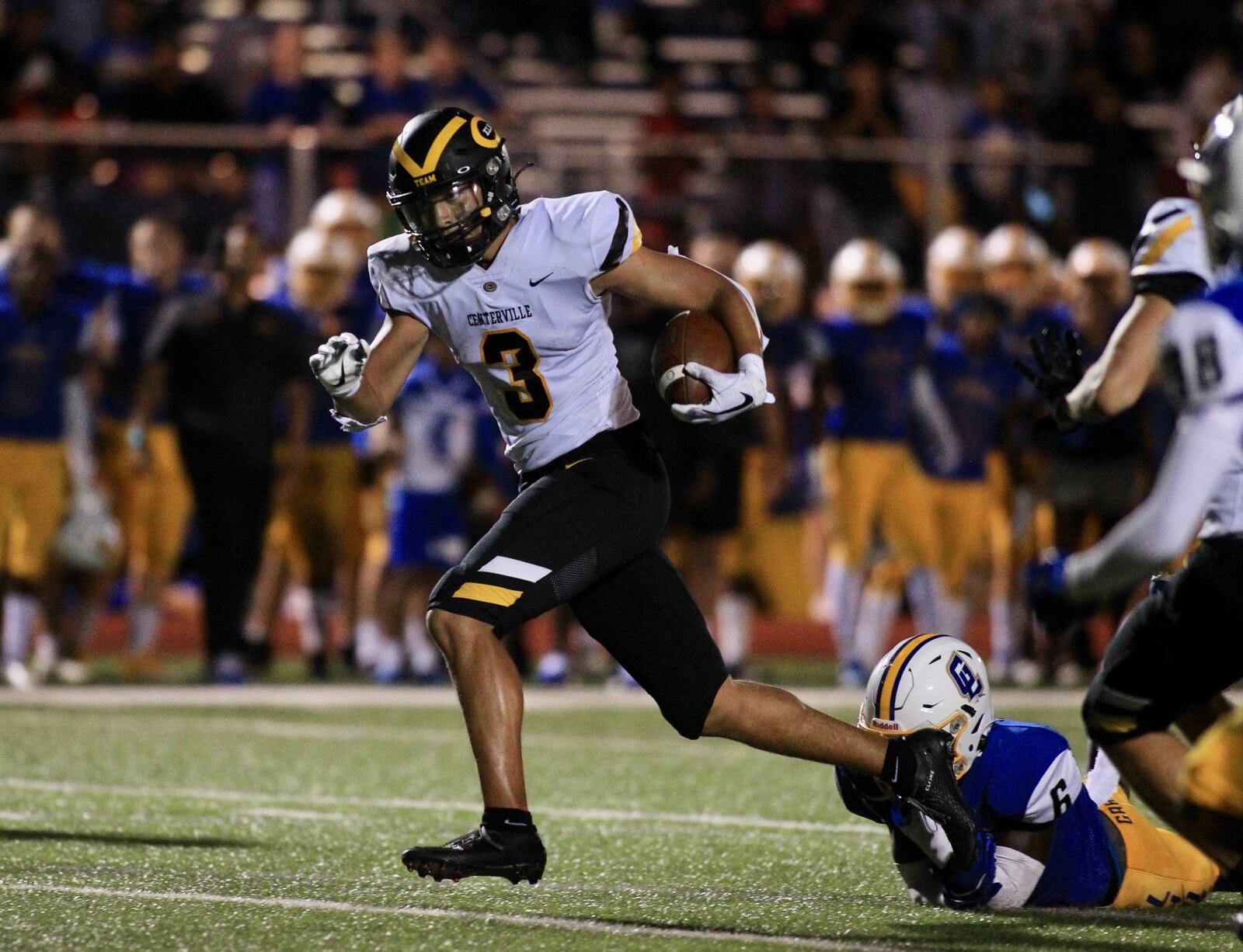 Centerville's Cameron Smith runs for a touchdown after a catch in the fourth quarter against Gahanna Lincoln on Friday, Sept. 3, 2021, at Gahanna. David Jablonski/Staff