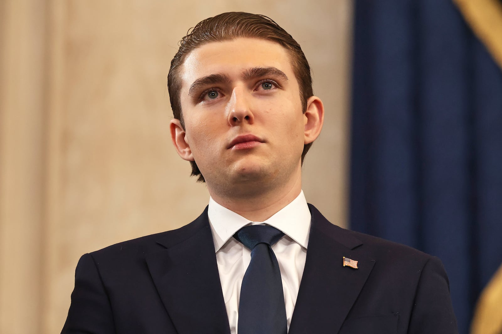 Barron Trump arrives before the 60th Presidential Inauguration in the Rotunda of the U.S. Capitol in Washington, Monday, Jan. 20, 2025. (Chip Somodevilla/Pool Photo via AP)