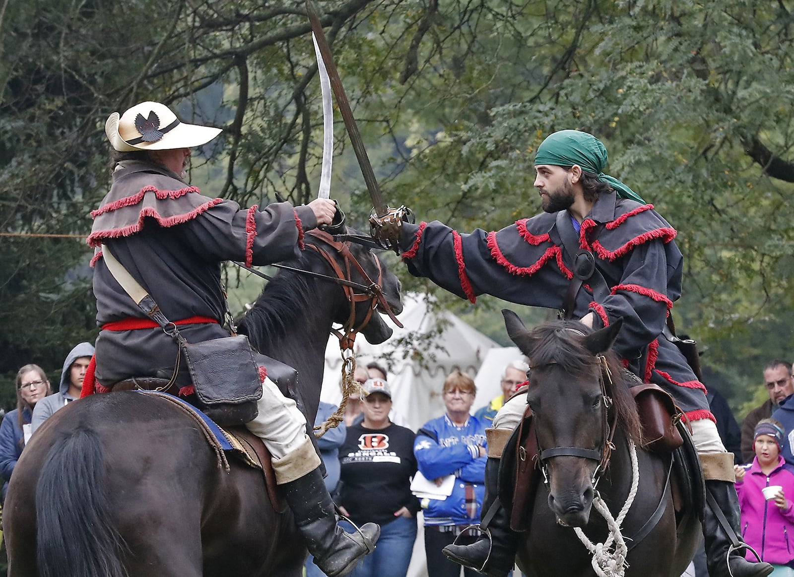 The Mounted Rangers give a demonstration of combat on horseback during last year’s Fair at New Boston. BILL LACKEY/STAFF