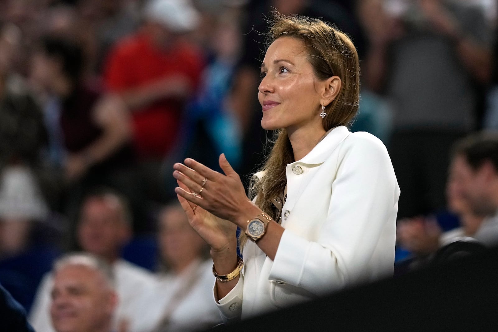 Jelena Djokovic reacts ahead of her husband Novak's quarterfinal match against Carlos Alcaraz of Spain at the Australian Open tennis championship in Melbourne, Australia, Tuesday, Jan. 21, 2025. (AP Photo/Asanka Brendon Ratnayake)