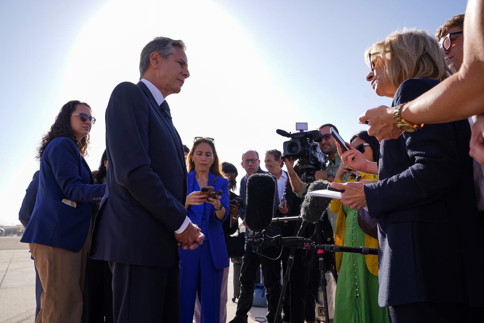 U.S. Secretary of State Antony Blinken speaks with members of the media as he arrives at Ben Gurion International Airport before departing for Riyadh, Saudi Arabia, in Tel Aviv, Israel, Wednesday, Oct. 23, 2024. (Nathan Howard/Pool Photo via AP)