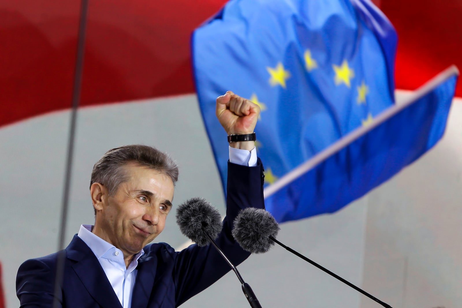 FILE - Billionaire Bidzina Ivanishvili, leader of the created by him the Georgian Dream party gestures greeting demonstrators during a rally in Tbilisi, Georgia, on April 29, 2024. (AP Photo/Shakh Aivazov, File)