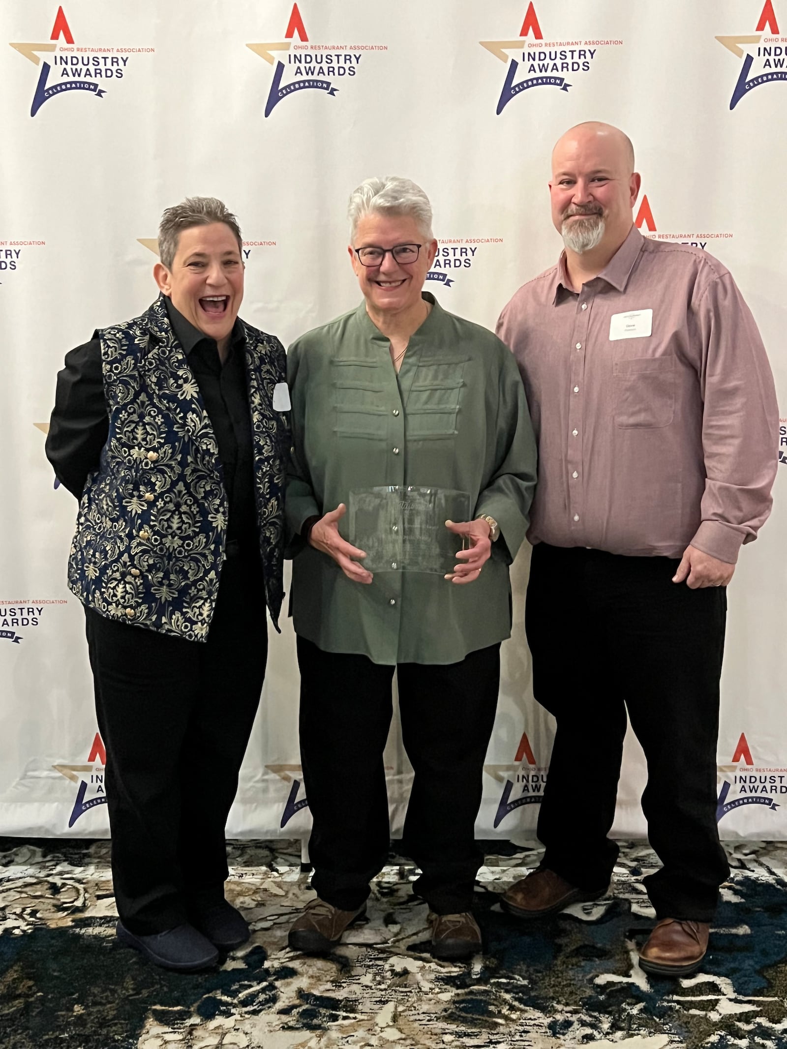 (Left to right): Ohio Restaurant and Hospitality Alliance Awards: Chefs Liz Valenti, Elizabeth Wiley and Dave Rawson pose after Wiley's Lifetime Achievement Award win. ALEXIS LARSEN