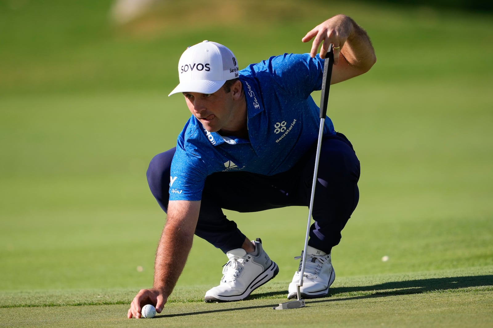 Denny McCarthy lines up his shot on the ninth green during the second round of the Sony Open golf event, Friday, Jan. 10, 2025, at Waialae Country Club in Honolulu. (AP Photo/Matt York)