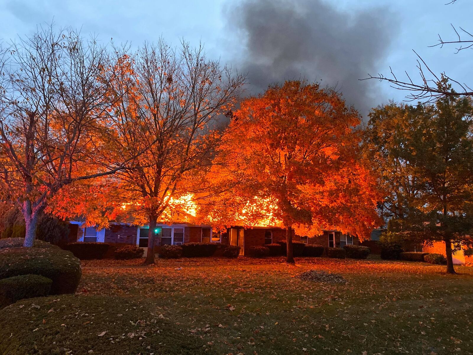 Multiple fire crews responded to a fire at an Enon apartment complex Sunday morning on South Harrison Street. Amy Jo Belcher/CONTRIBUTED