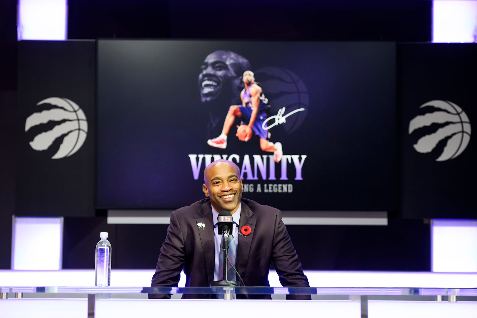 Former Toronto Raptors player Vince Carter speaks to media ahead of his number retirement, before an NBA basketball game between the Toronto Raptors and the Sacramento Kings at the Scotiabank arena in Toronto on Saturday, Nov. 2, 2024. (Christopher Katsarov/The Canadian Press via AP)