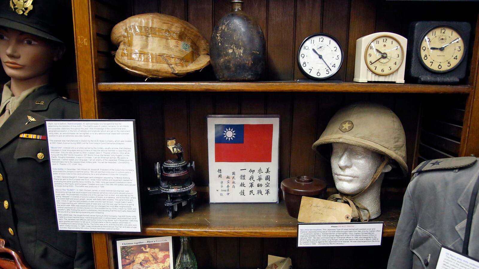 WWII artifacts, including a Japanese helmet, lower right, at the Miami Valley Military History Museum located in Building 120 on the Dayton Veterans Administration campus. The museum will receive $500,000 from the state's capital projects budget. FILE PHOTO