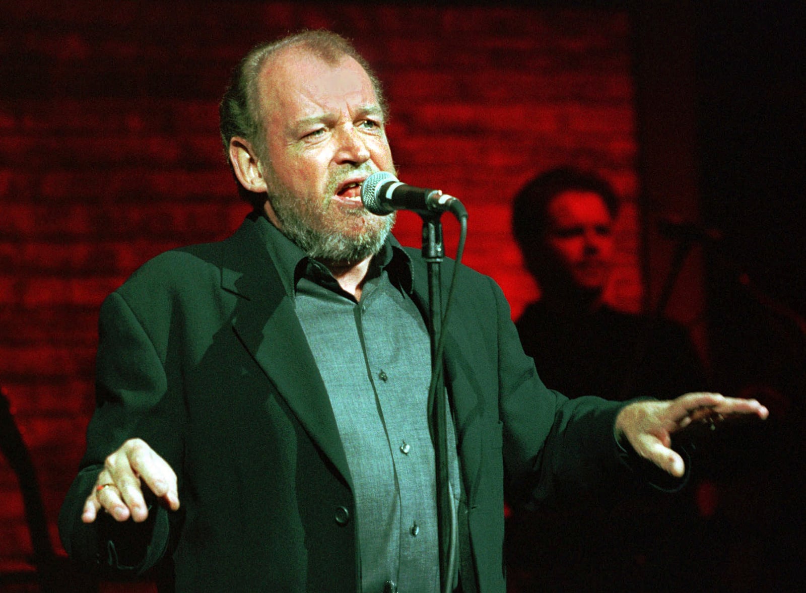 FILE - Joe Cocker performs in Neuss, Germany on Nov. 15, 1997. (AP Photo/Edgar Schoepal, File)