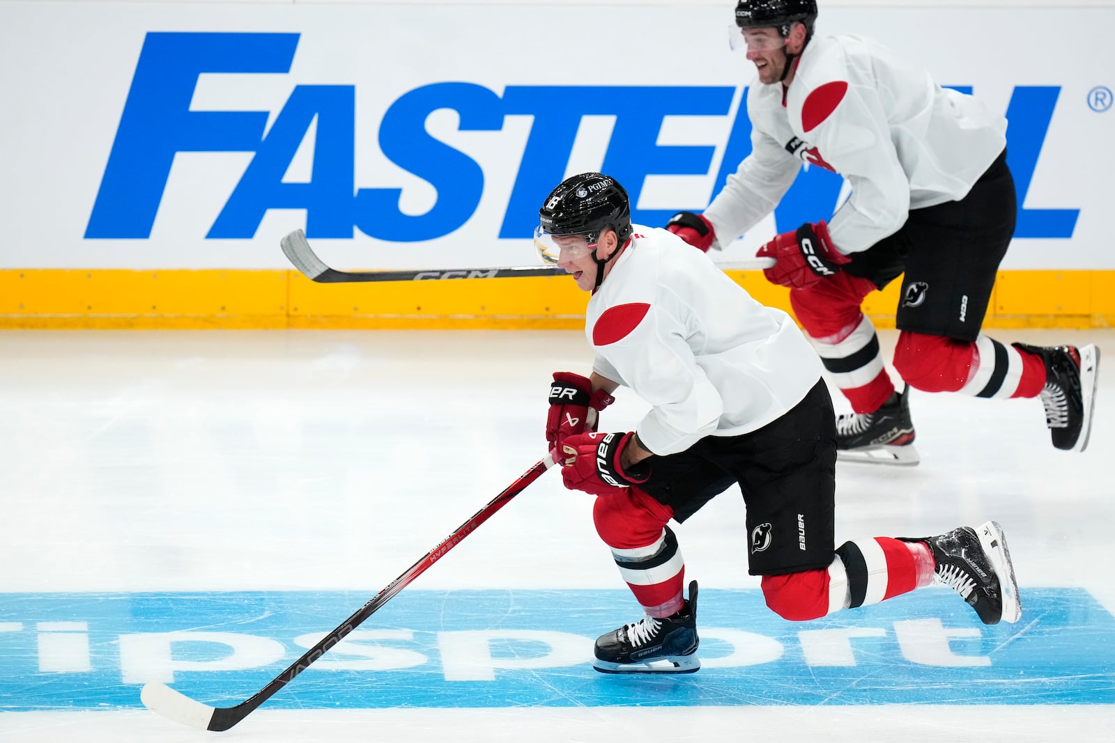 New Jersey Devils' Ondřej Palat speeds up during a practice session, a day before their NHL hockey game against Buffalo Sabres, in Prague, Czech Republic, Thursday, Oct. 3, 2024. (AP Photo/Petr David Josek)