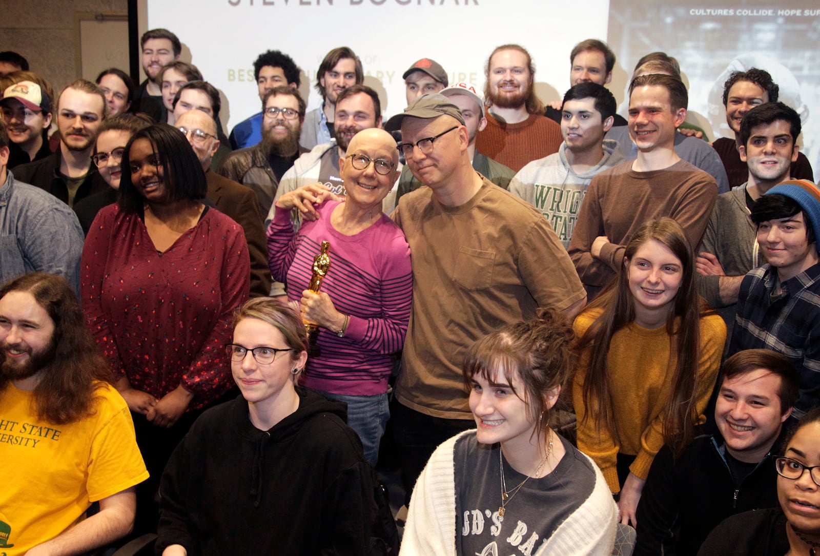 Julia Reichert and Steven Bognar, who won an Oscar in the documentary feature category for âAmerican Factory,â returned to Wright State University Thursday to speak with students in the Department of Theatre, Dance and Motion Pictures. Reichert is a professor emeritus at WSU and Bognar is an alumnus and former motion pictures faculty member. The couple brought their Oscar statuettes for the students to pass around and shared their documentary film making process. âAmerican Factoryâ follows the creation of the Chinese-owned automotive glass-factory Fuyao Glass America in the same building that had once housed a General Motors assembly operation in Moraine. LISA POWELL / STAFF