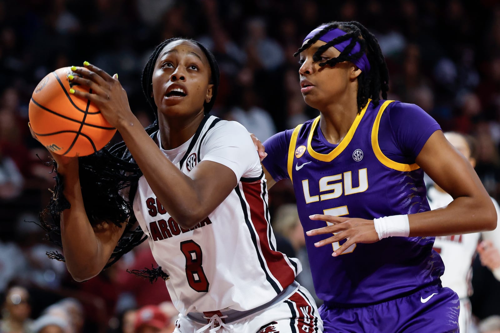 South Carolina forward Joyce Edwards (8) looks to shoot against LSU forward Sa'Myah Smith, right, during the first half of an NCAA college basketball game in Columbia, S.C., Friday, Jan. 24, 2025. (AP Photo/Nell Redmond)