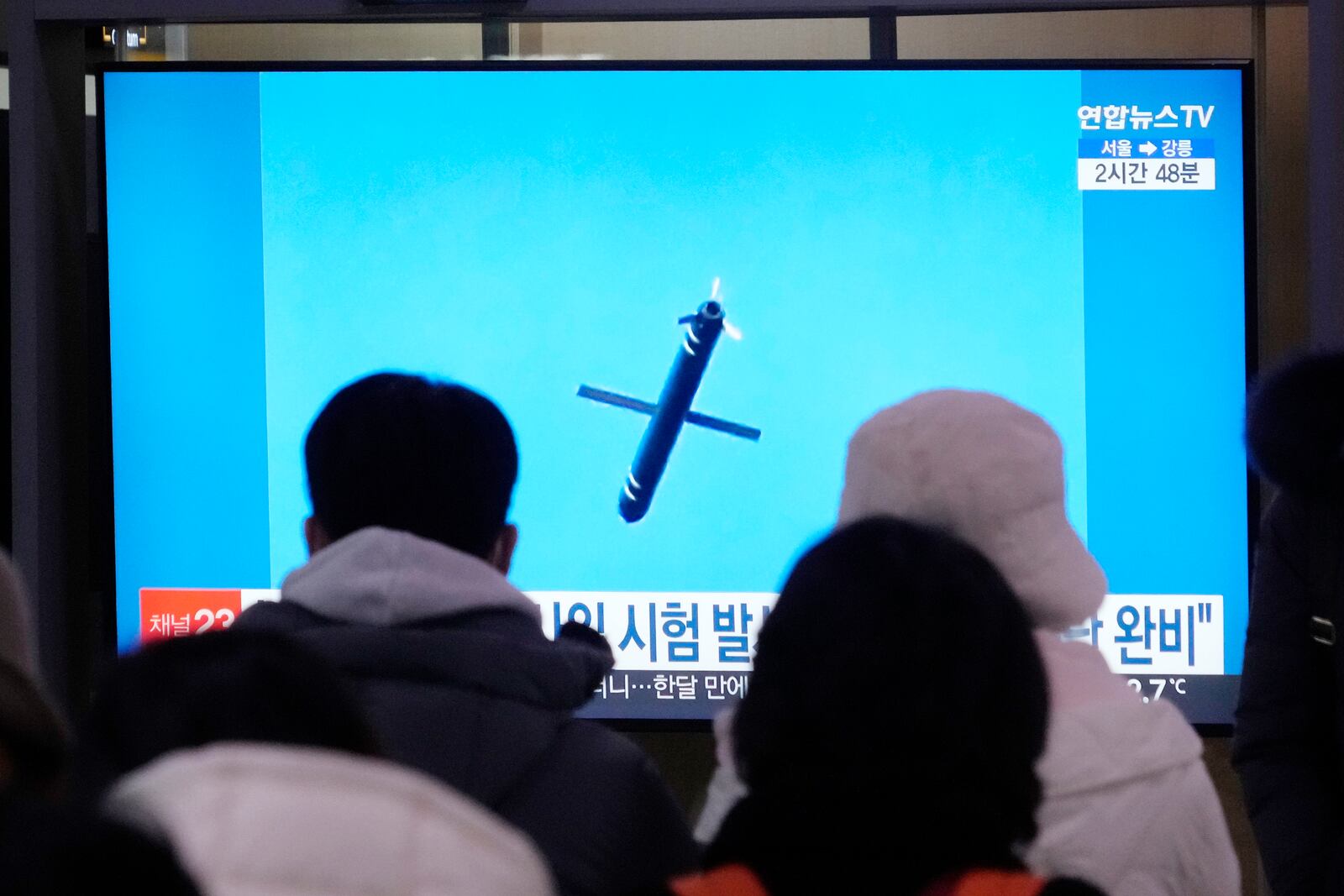 A TV screen shows an image of North Korea's missile launch during a news program at Seoul Railway Station in Seoul, South Korea, Sunday, Jan. 26, 2025. (AP Photo/Ahn Young-joon)