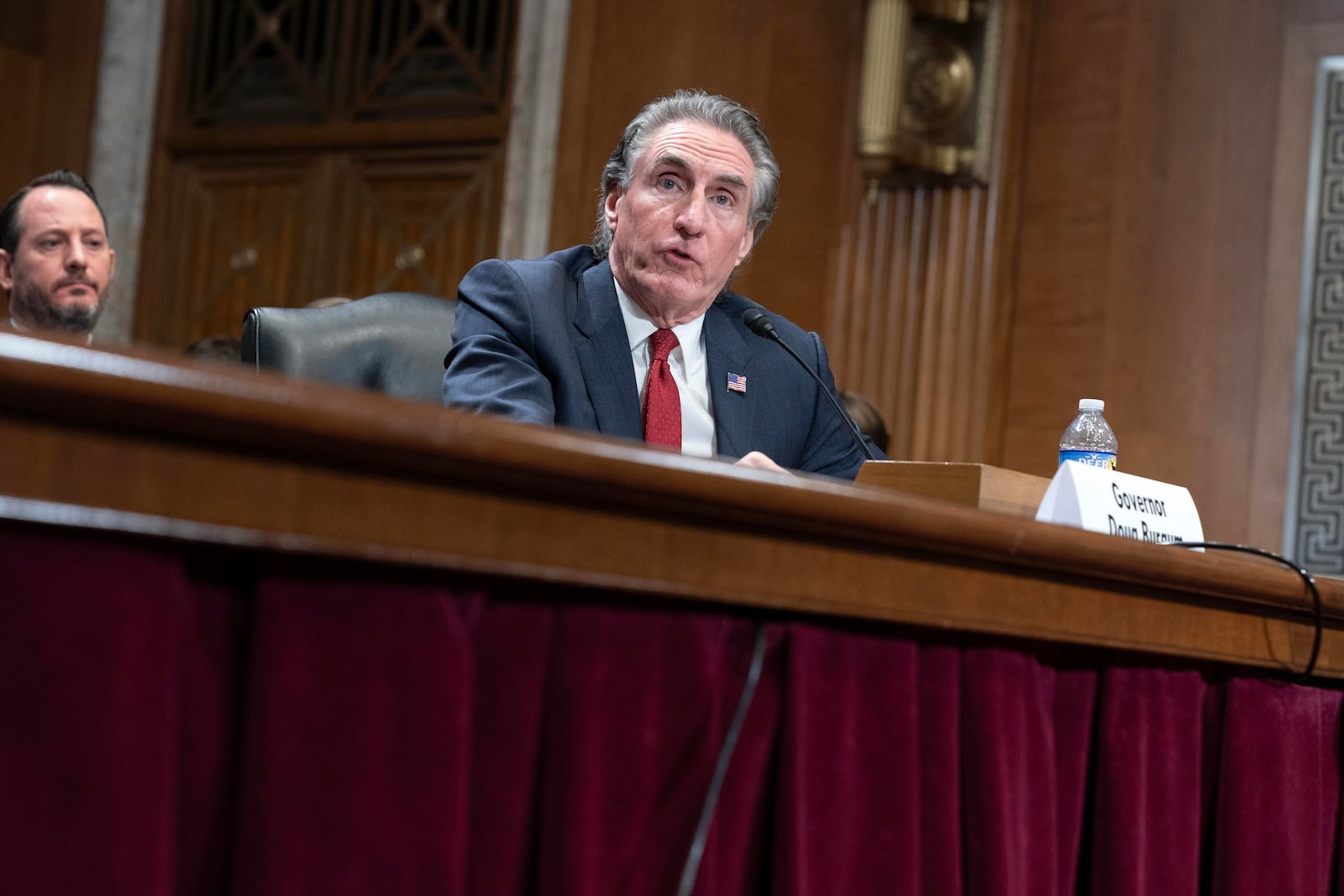 Former Gov. Doug Burgum, President-elect Donald Trump's choice to lead the the Interior Department as Secretary of the Interior, testifies before the Senate Energy and Natural Resources Committee on Capitol Hill in Washington, Thursday, Jan. 16, 2025. (AP Photo/Jose Luis Magana)