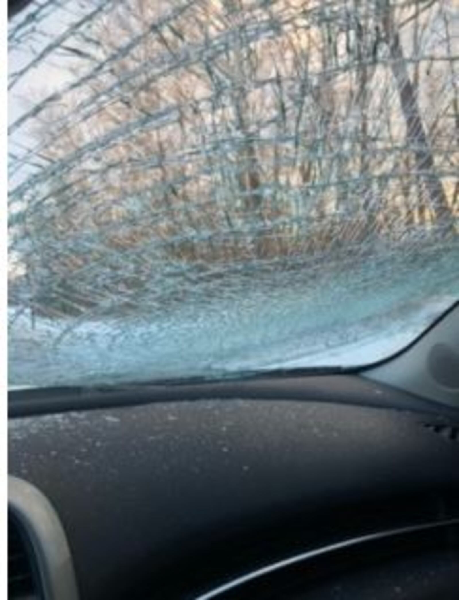 This vehicle was damaged Saturday on Interstate 71 south when a chunk of ice and snow flew off a vehicle and smashed the windshield of another car. The ice and snow chunk damaged the vehicle and sent glass shards flying on the passenger side of the vehicle. Other than some scratches, there were no injuries. CONTRIBUTED/JOEY KLEINOW